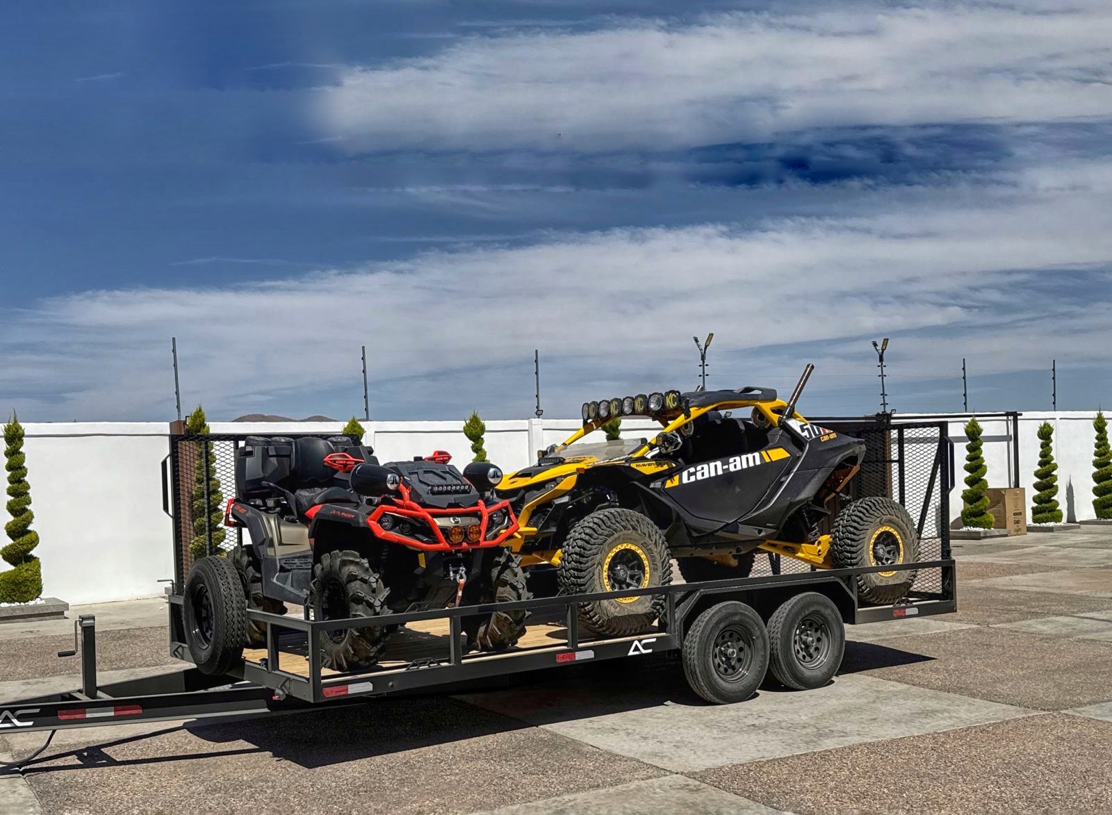 Heavy-duty custom equipment trailer with mesh sides for ATV and UTV transport - El Paso custom trailer manufacturing